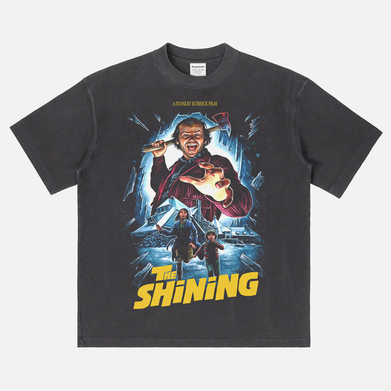Stanley Kubrick's The Shining horror movie graphic t-shirt with custom movie poster art on a washed black heavyweight streetwear tee