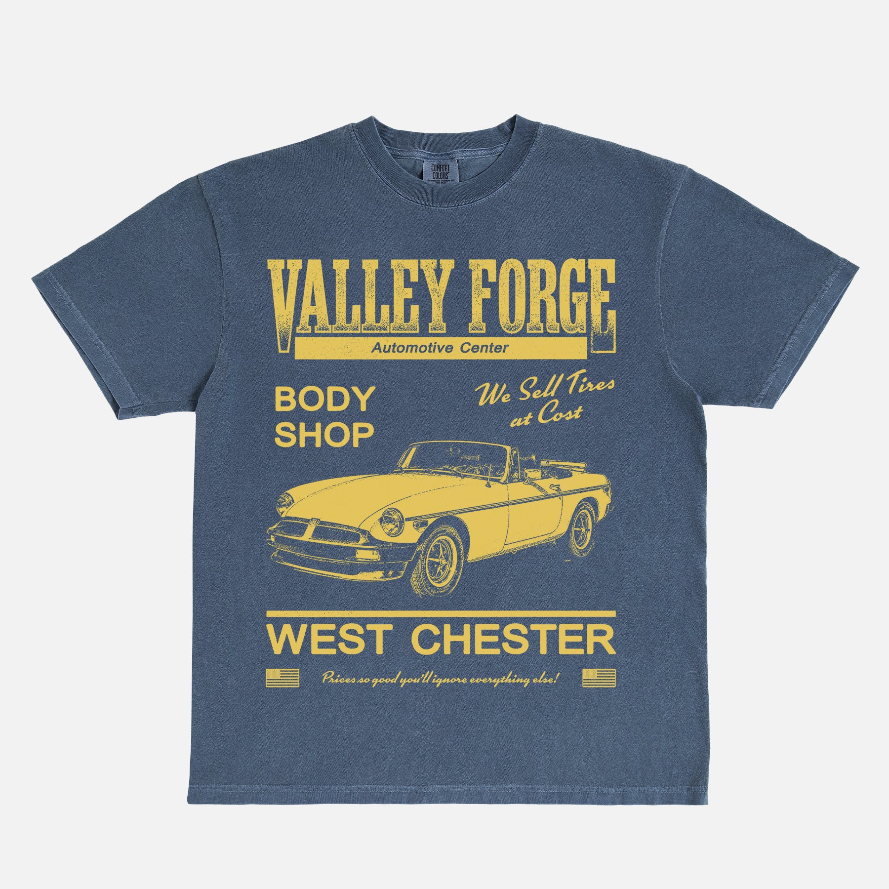 Funny Shane Gilles Tires TV Show graphic t-shirt with vintage Valley Forge Automotive center logo on a unisex navy and yellow comfort colors shirt