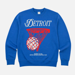 Retro 80s Detroit Pistons basketball sweatshirt with red and white streetwear graphic on a royal blue unisex crewneck