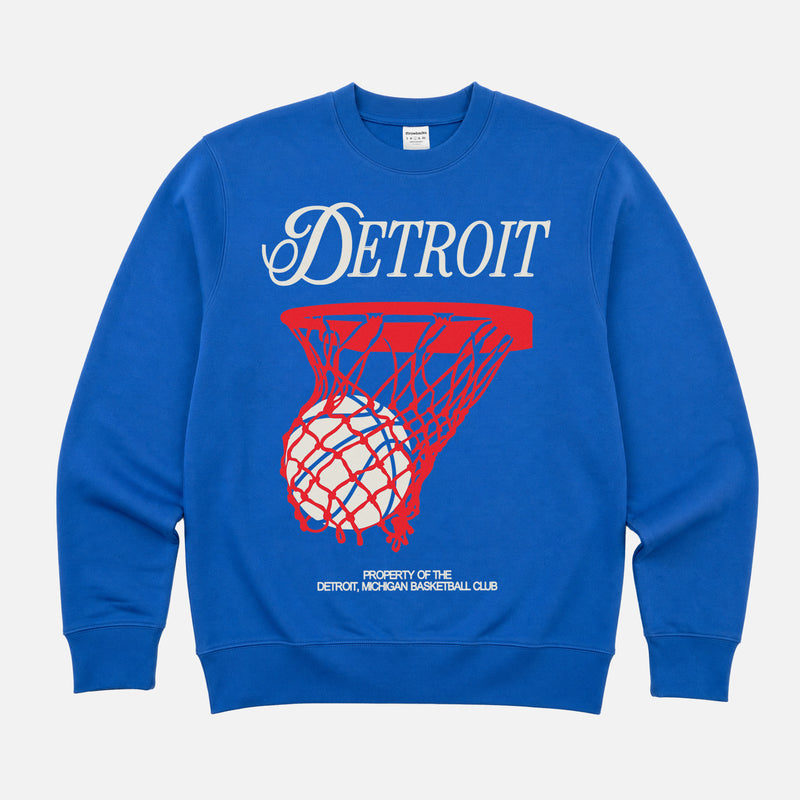 Retro 80s Detroit Pistons basketball sweatshirt with red and white streetwear graphic on a royal blue unisex crewneck