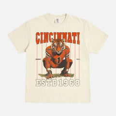 Retro Cincinnati Bengals streetwear graphic t-shirt with mascot graphic and orange pinstripes on a unisex comfort colors tee