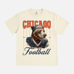 Off white Chicago Bears comfort colors graphic tee with bear mascot and pinstripes on a unisex comfort colors t-shirt