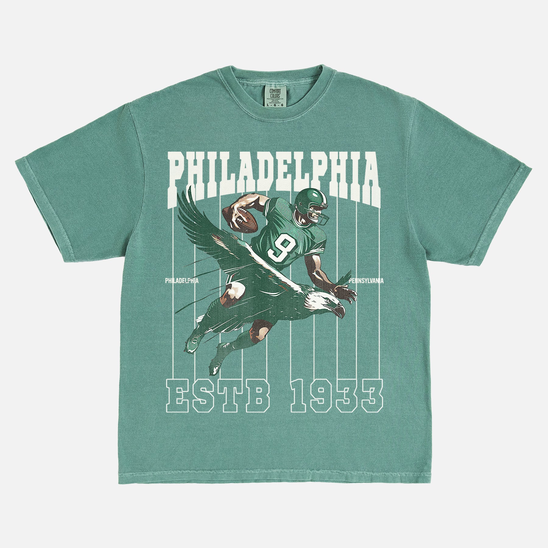 Retro Philadelphia Eagles football t-shirt with vintage philly eagle mascot on an washed green comfort colors graphic tee