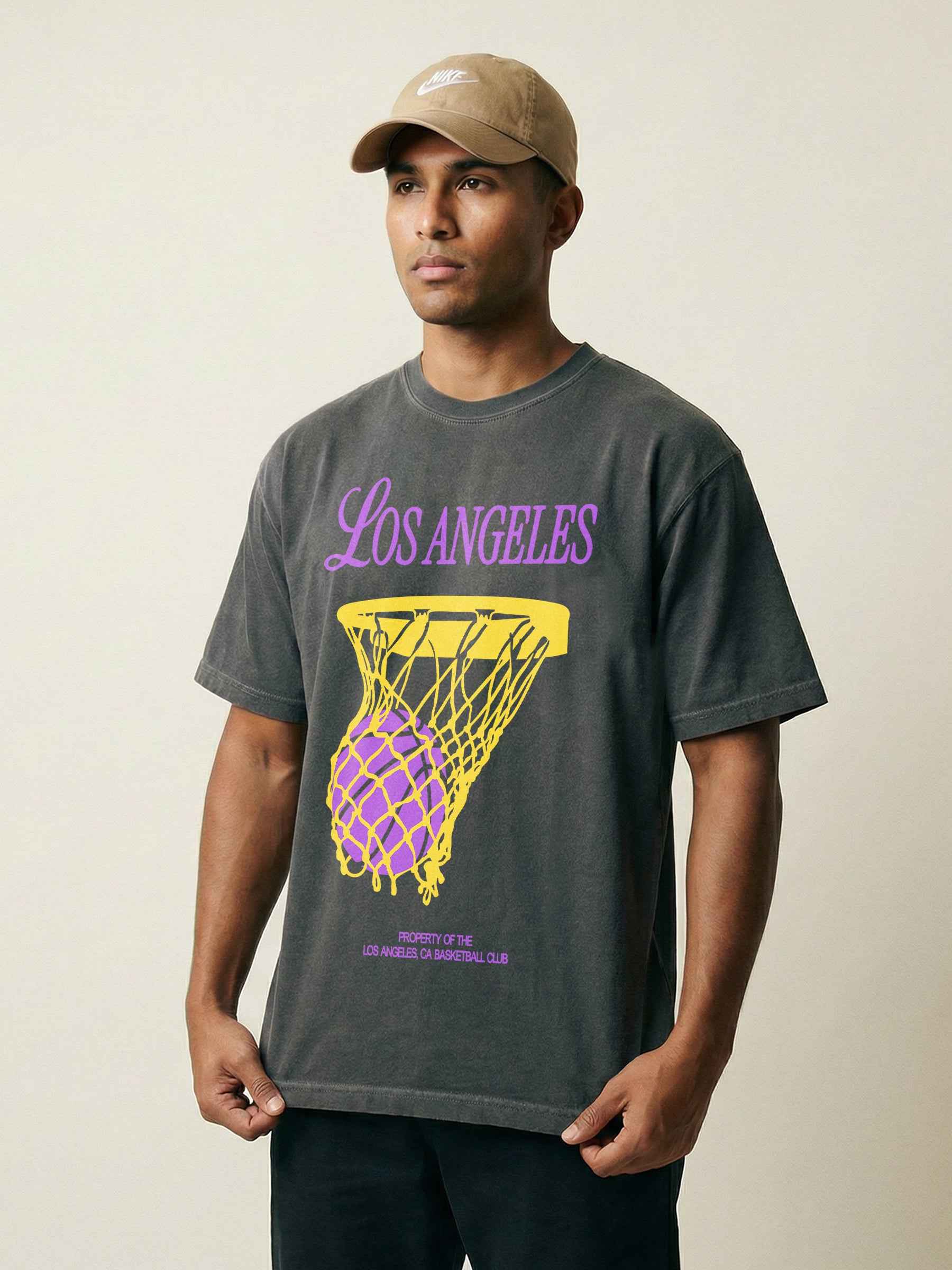 Old School Los Angeles Lakers streetwear graphic t-shirt with purple and gold bball jersey text on a washed black comfort colors tee