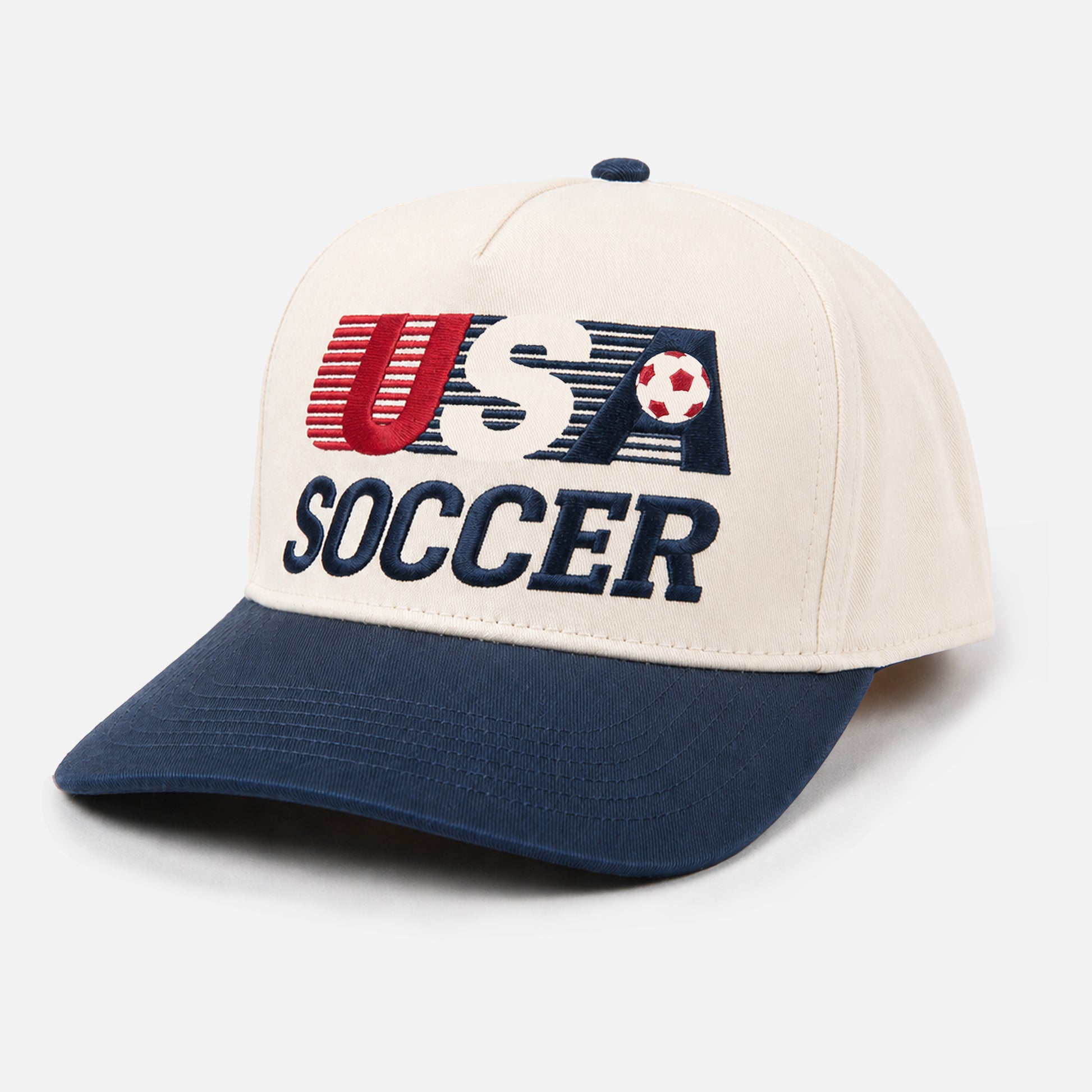 Retro beige and navy US Soccer Team world cup snapback hat with vintage embroidered 90s USA soccer logo