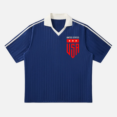 Vintage navy USA soccer team jersey with retro collar and a modern USMNT badge logo