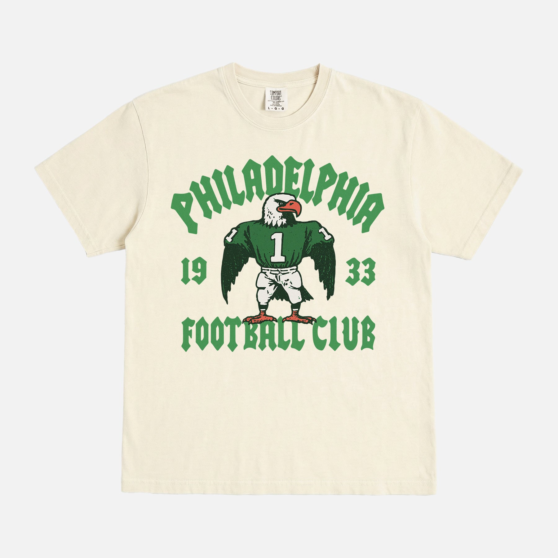 Philadelphia eagles nfl streetwear graphic tee with throwback eagle mascot on a faded cream t-shirt