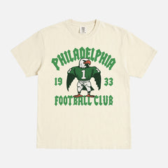Philadelphia eagles nfl streetwear graphic tee with throwback eagle mascot on a faded cream t-shirt