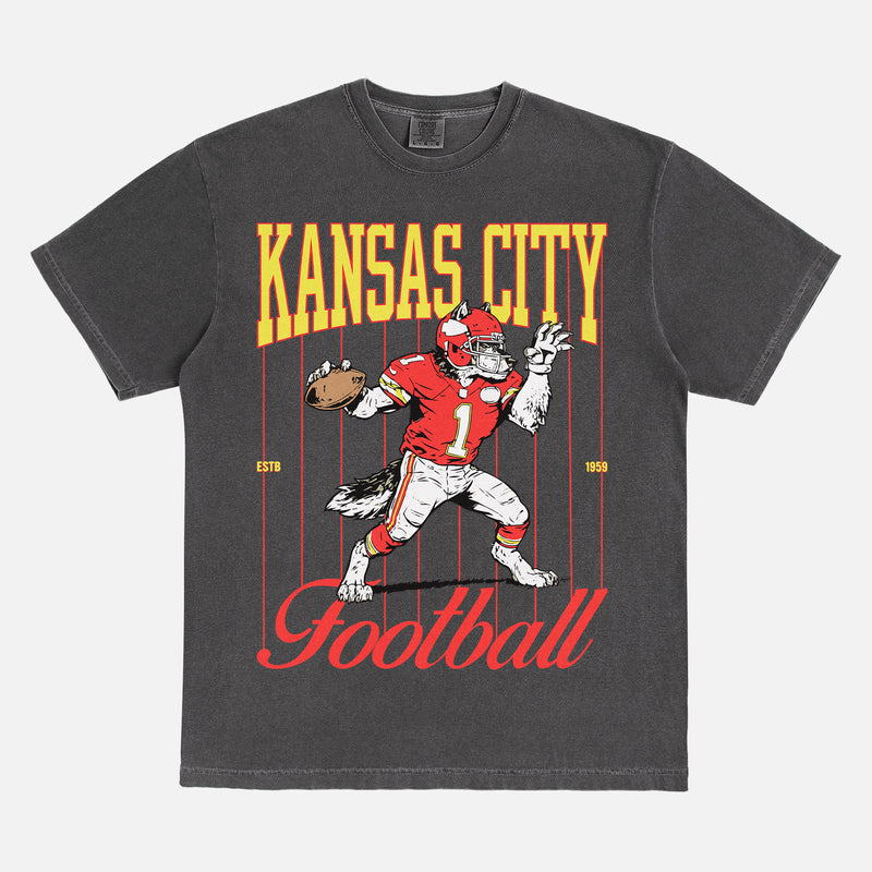 Vintage 80s 90s Kansas City Chiefs washed black comfort colors graphic tee with old school wolf mascot and pinstripes
