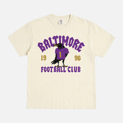 Retro black and purple Baltimore ravens nfl football fan graphic tee with streetwear text and raven mascot