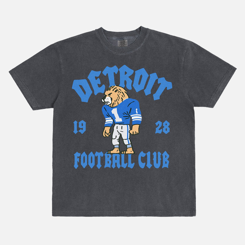 Detroit Lions nfl football t-shirt with throwback design and mascot art on an washed black comfort colors graphic tee