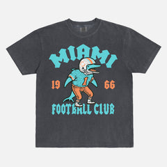 Cool retro Miami Dolphins NFL streetwear graphic t-shirt on washed black comfort colors shirt 