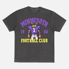 Minnesota Vikings NFL football fan streetwear graphic t-shirt with throwback viking mascot on a faded black comfort colors shirt