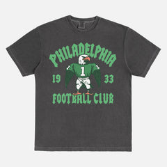 Philadelphia eagles nfl streetwear graphic tee with throwback eagle mascot on a faded black t-shirt