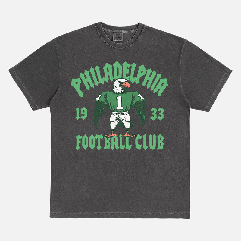 Philadelphia eagles nfl streetwear graphic tee with throwback eagle mascot on a faded black t-shirt