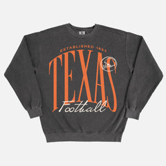 Heavyweight washed black Texas Longhorns college football sweatshirt with oversized orange print on comfort colors crewneck