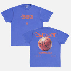 Vintage Oklahoma City Thunder OKC basketball streetwear t-shirt with front and back print on a faded blue comfort colors shirt for sale at Throwbacks