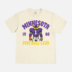 Minnesota Vikings NFL football fan streetwear graphic t-shirt with throwback viking mascot on a faded cream comfort colors shirt