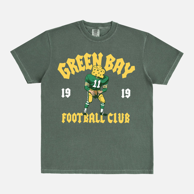 Modern vintage Green Bay Packers t-shirt with vintage mascot streetwear style graphic on a washed green comfort  colors shirt