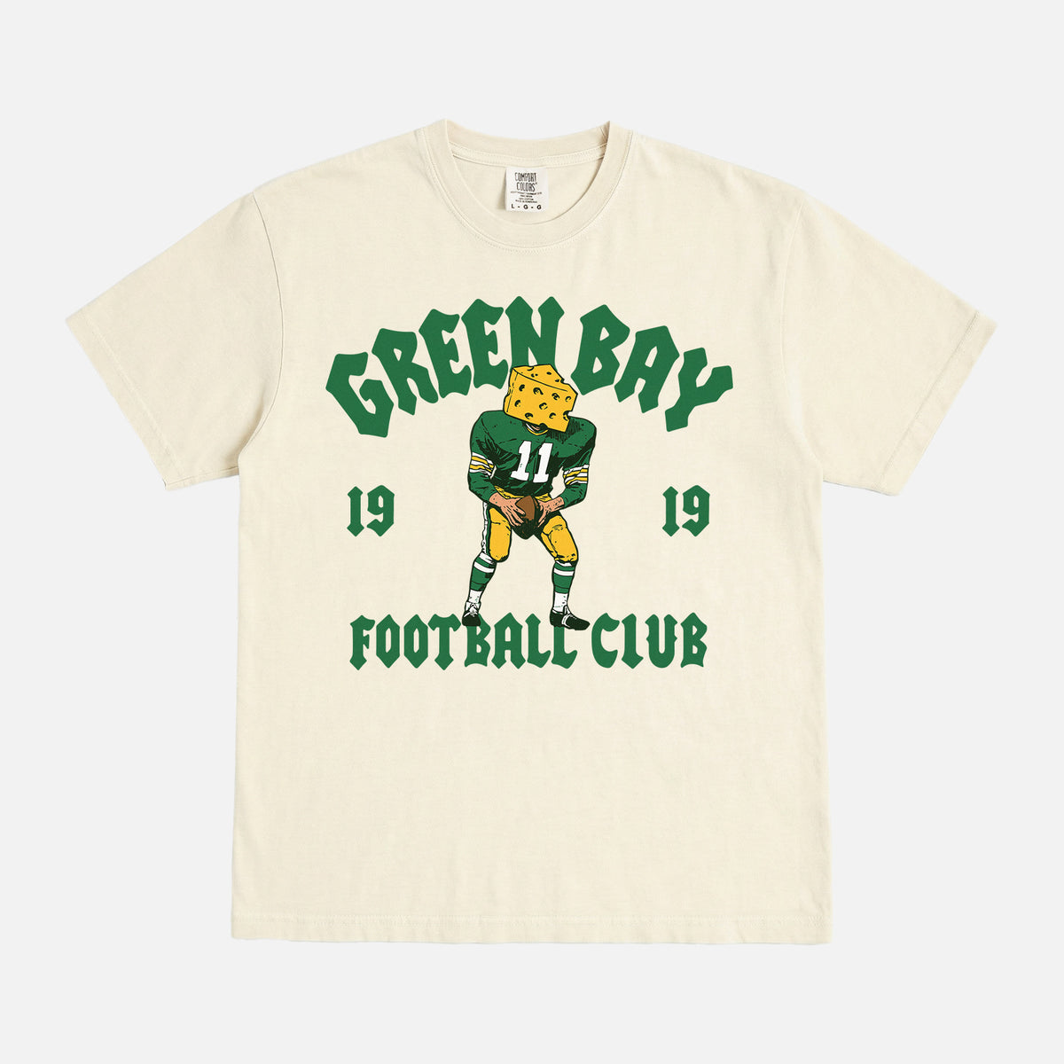 Modern vintage Green Bay Packers t-shirt with vintage mascot streetwear style graphic on a washed cream comfort  colors shirt