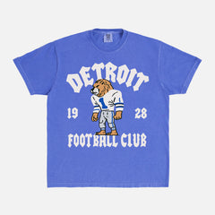 Detroit Lions nfl football t-shirt with throwback design and mascot art on an washed royal blue comfort colors graphic tee